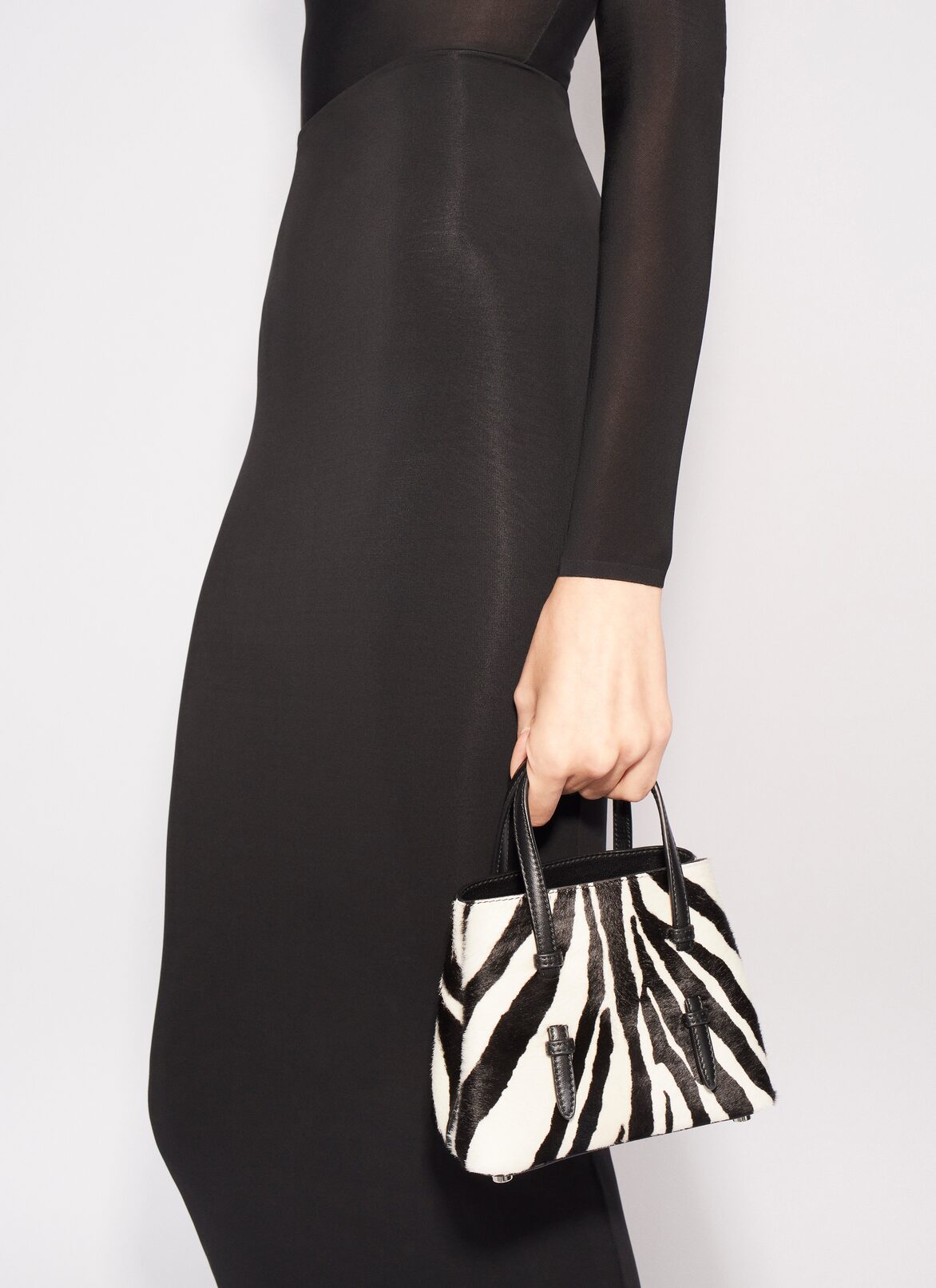 MINA 16 BAG IN ZEBRA PRINT ON HAIRY CALFSKIN ALAÏA BLACK MINA 16 BAG IN ZEBRA PRINT ON HAIRY CALFSKIN